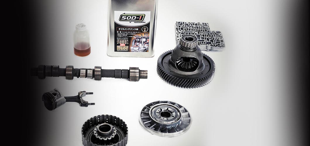 Can of SOD-1 Plus next to a group of clean shiny metal car parts